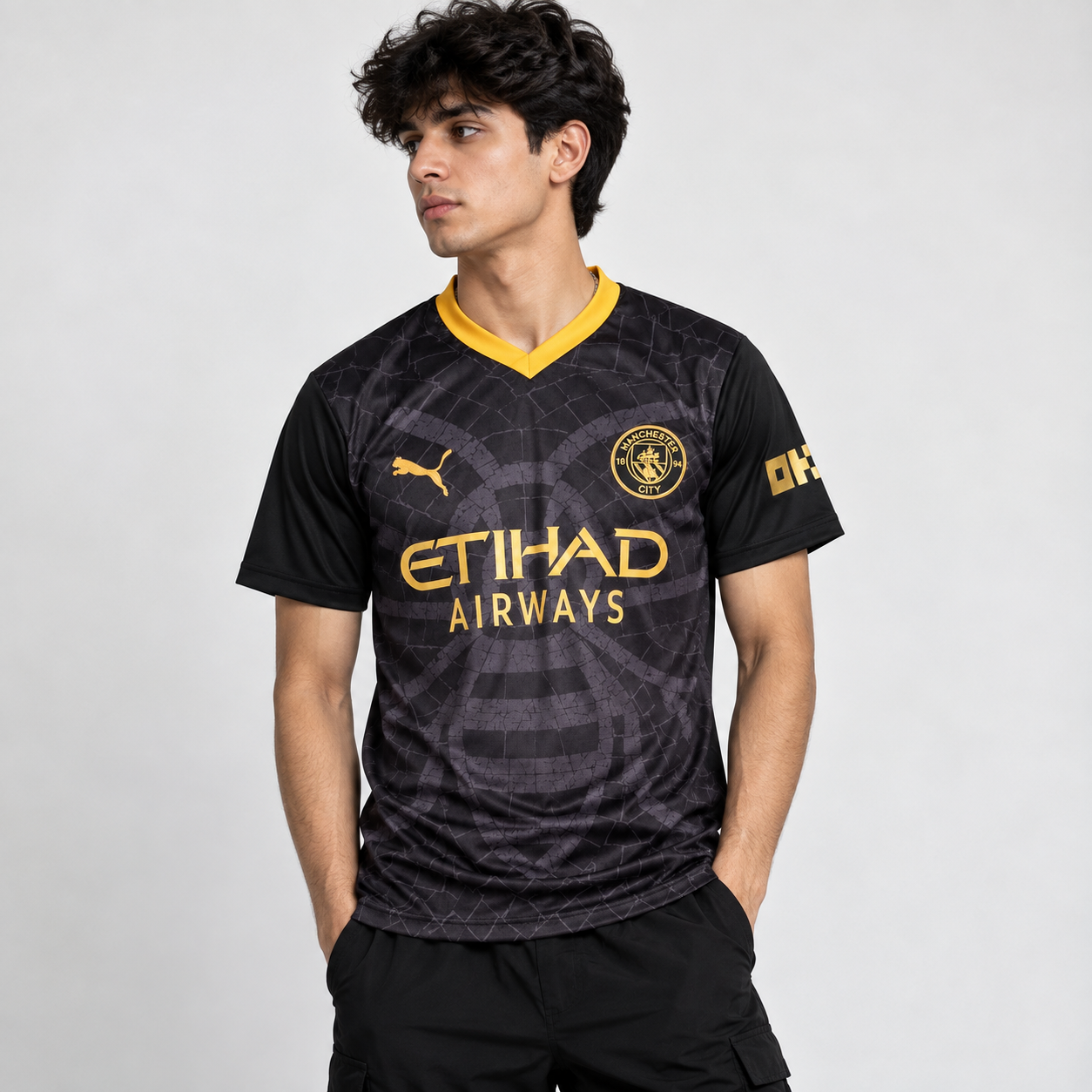 Manchester City Black Football Jersey – Gold Detail Fan Shirt